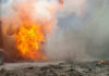 Deadly Barrage on Kyiv — Mystery Missile Raises Eyebrows A large explosion with flames and smoke.