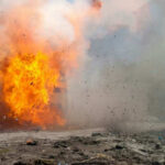 A large explosion with flames and smoke.