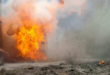 Deadly Barrage on Kyiv — Mystery Missile Raises Eyebrows A large explosion with flames and smoke.