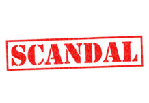 Red stamp with the word scandal