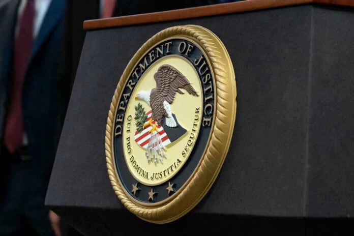 shutterstock_2290672573 Department of Justice seal on a podium.