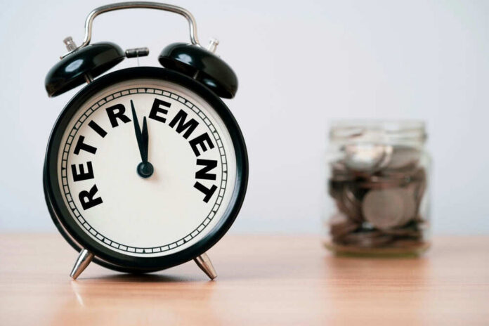 Alarm clock showing retirement and jar of coins