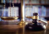 Scales and gavel on a judges desk.