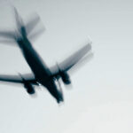 Airplane in flight with motion blur.