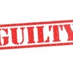 Mardi Gras Melee: Shia’s Guilty Twist Red stamp with the word guilty inside