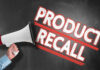 RECALL ALERT: Hidden Fire Timebomb? Megaphone and Product Recall text on chalkboard.