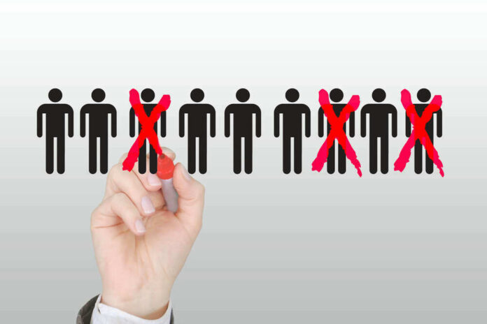 shutterstock_1688476213 Hand crossing out stick figures with a red marker.