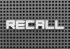 RECALL: SUV’s Moonroofs Go Airborne! The word 'RECALL' displayed on a perforated surface