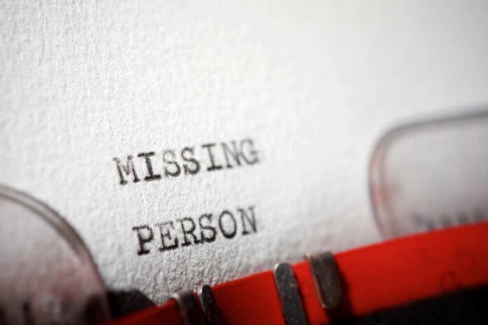 Close-up of a typewritten document with the words 'MISSING PERSON'