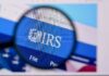 Magnifying glass focusing on the IRS website logo