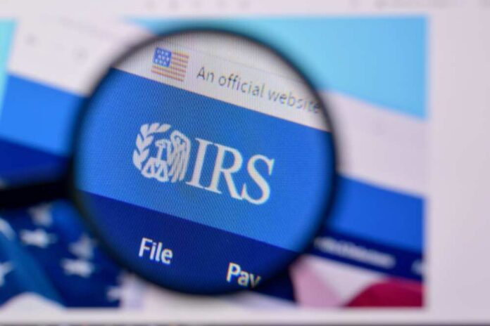 Magnifying glass focusing on the IRS website logo