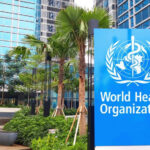 World Health Organization sign outside modern building