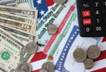 ALERT: Social Security Cliff Moved Up Various denominations of U.S. currency and financial documents on a flag background