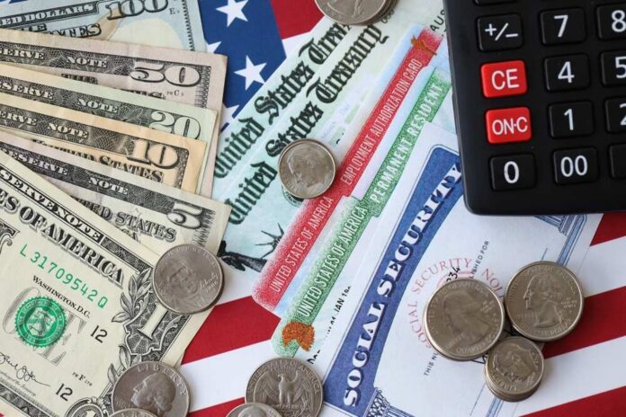 American,Us,Dollars,Money,Bills,,Social,Security,Number,Card,And Various denominations of U.S. currency and financial documents on a flag background