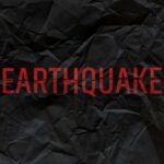 Quake Chaos, Vanishing Trust Crumpled black paper with the word 'EARTHQUAKE' in bold red letters