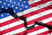 Communist Pipeline Into U.S. Revealed?! Cracked United States flag on textured surface.