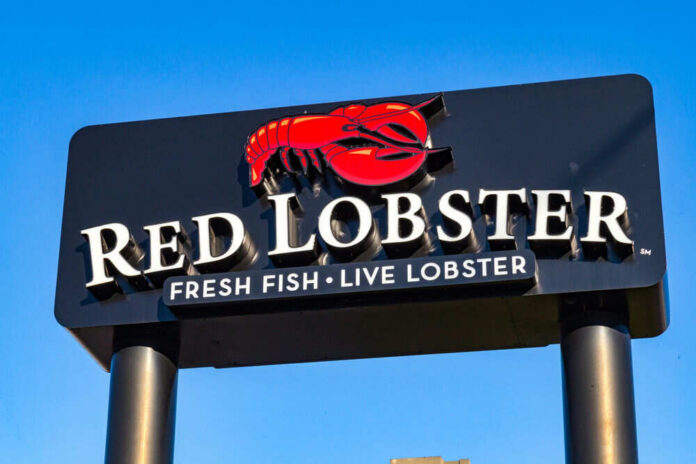 shutterstock_554755114 Red Lobster restaurant sign with red lobster logo.