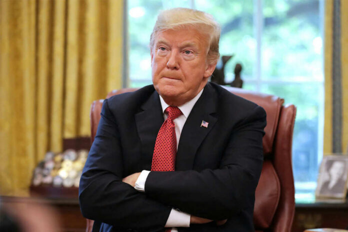 trump-arms-folde President Donald Trump