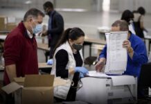 Georgia digs in to protect personal information of election workers from DOJ inquiry