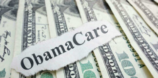 ObamaCare text over money background.