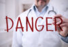 Walmart Recall Warning: Deadly Danger? Doctor writing danger on transparent screen