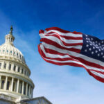 Emergency Audio Ignites DC Panic U.S. Capitol building with American flag waving.