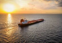 Tanker Chaos Triggers Sudden Oil Cutoff Oil tanker sailing at sunset on open sea
