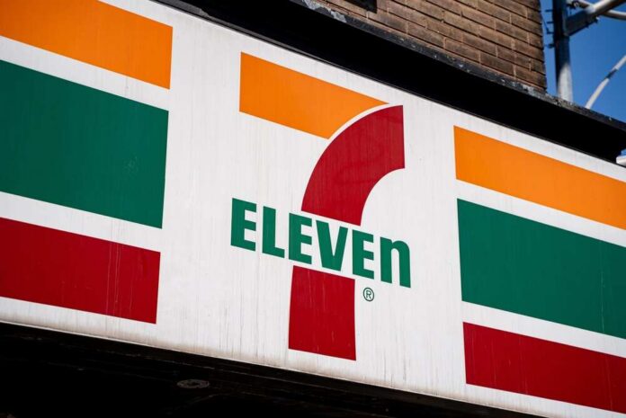 Close,Up,Of,7,Eleven,Store,Sign,On,Building,Exterior. Exterior view of a 7-Eleven convenience store