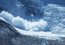 Avalanche Gulch Strikes Again An avalanche cascading down a glacier in a mountainous region