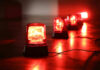 Water Grid Breached — 12 States Rattled Red emergency lights on dark floor, illuminating the area.