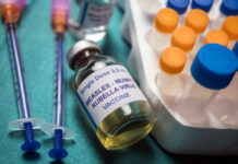 Vaccine Shock: Trump Splits MMR A healthcare professional administering a vaccine to a child's arm