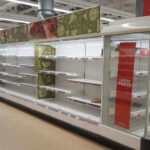 Metal In Dinner? Massive Recall Hits Grocers Empty supermarket shelves with great prices signage