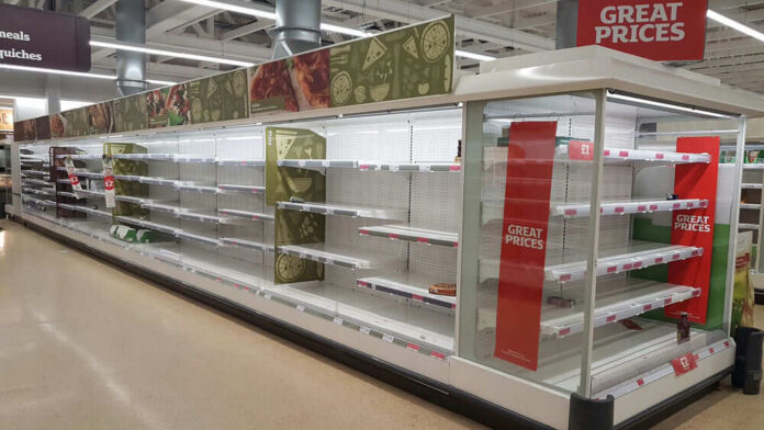 shutterstock_1702064173 Empty supermarket shelves with great prices signage