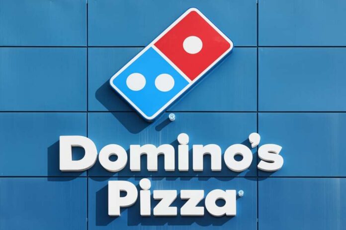 La,Eliana,,Spain,-,October,27,,2021:,Domino's,Pizza,Is Domino's Pizza logo on a blue background