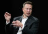 TODAY: Musk Honored By Ukraine Elon Musk in a suit talking.