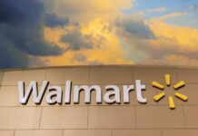 Walmart Favorite Pulled — Listeria Scare Walmart sign against a cloudy sky