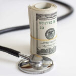 Upfront Bills Surge — Patients Blindsided Medical staff walking through a hospital corridor