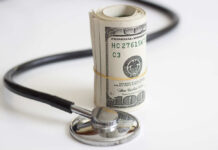 Upfront Bills Surge — Patients Blindsided Medical staff walking through a hospital corridor