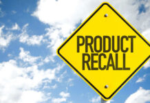 Border Blunder Yanks 15 Tons Of Beef Yellow product recall sign against cloudy sky