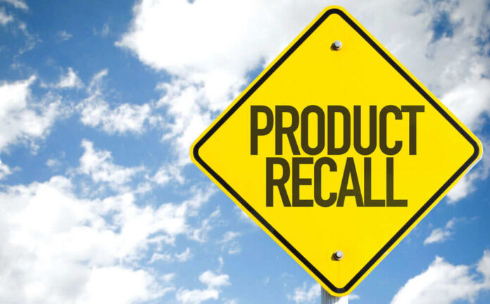 shutterstock_419918254 Yellow product recall sign against cloudy sky