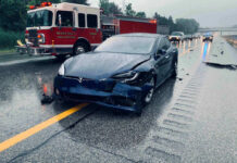 VIDEO: Autopilot Panic After Deadly Crash Car crash with a Tesla on a rainy highway.