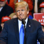 President Donald Trump at a rally with supporters.