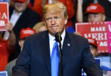 Trump Dangles $5,000 – Will It Work? President Donald Trump at a rally with supporters.