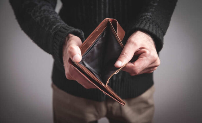 Man,Holding,Empty,Wallet.,No,Money Person holding an open empty wallet