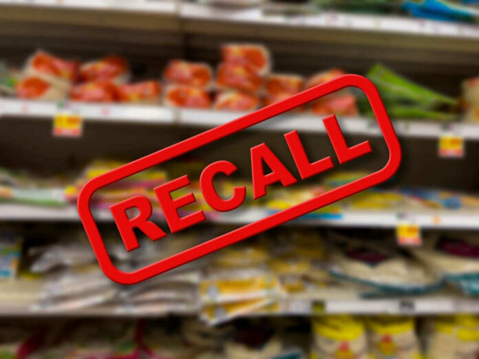 Recall notice over grocery store shelves.