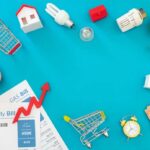 Affordability SMASHED – These Americans HURT Household bills, piggy banks, and energy items on blue background