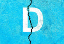 Democrat QUITS After Explosive Harassment Probe White letter D on cracked blue surface.