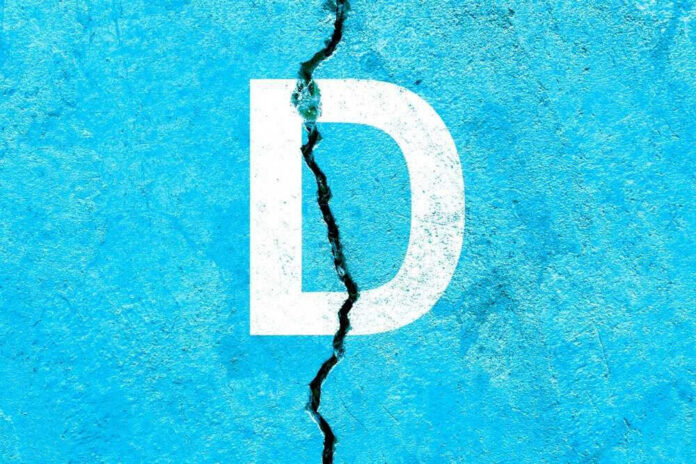 shutterstock_2222197073-1 White letter D on cracked blue surface.
