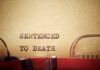 First Woman Execution In 200 Years For THIS State Typewriter typing the phrase 'Sentenced to Death' on aged paper