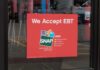 SNAP Shock: 80 Hours Or Else Sign indicating EBT acceptance for food purchases